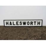 A painted wood signal box name plate "Halesworth" with metal letters