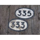 Two small modern composition oval bridge plate numbers 333 and 335