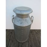 An aluminium milk churn