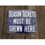 An enamelled railway notice "Season Tickets Must Be Shewn Here" (sic).