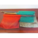 Three trackside/signal box flags, two green and one red,