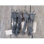 A set of four Victorian cast iron door knockers in the form of rams heads (4)