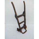 A railway platform wooden framed sack barrow, stamped WICKHAM MARKET