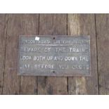 A cast iron LNER Notice "BEWARE OF THE TRAINS LOOK BOTH UP AND DOWN THE LINE BEFORE YOU CROSS"