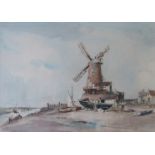 ARTHUR E. DAVIES (1893-1988) A framed and glazed watercolour of Cley windmill, Norfolk.