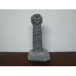 A carved granite Celtic cross, miniature example of the Lanhearn Cross,