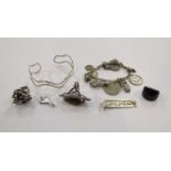A box of vintage silver jewellery including silver charm bracelet and charms and silver and semi