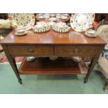 A 19th Century Sheraton style serving table with cross banded decoration,