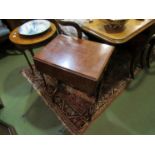 A 19th Century plum mahogany occasional table with swivelling drop flap top and one drawer
