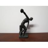 A bronze figure of a discus thrower