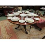 A Georgian mahogany and satinwood inlaid tilt top breakfast table on tripod base