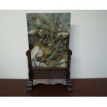 A 19th Century Oriental screen, specimen stone panel with high relief tree landscape,