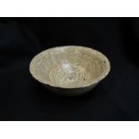 A Chinese Song Dynasty marbled clay bow, 13cm diameter, 5.
