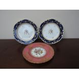 Two Royal Crown Derby plates with hand painted vase detail,