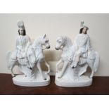 A pair of 19th Century Staffordshire flatback figures, gentleman on horse back,
