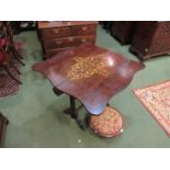 A satinwood inlaid Sutherland cylinder 'Book table' the shaped top over barley twist supports