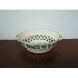 A 19th Century Wedgwood creamware chestnut basket with pierced lattice side,