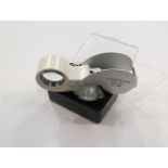 A 40x LED illuminated jeweller's loupe,