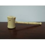 A 19th Century ivory gavel with turned handle (worn),