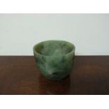 A 19th Century moss jade pot, 8cm tall, 10.