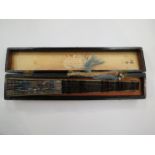 An Oriental hand painted fan, chinoiserie stick ends in associated box,