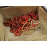 A box of antique coral jewellery including coral bracelet,
