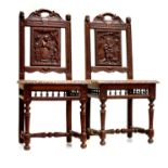 A 19th Century Jacobean revival oak, pair of hall chairs,