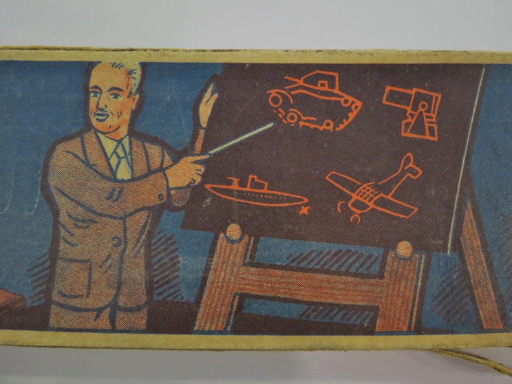 A Third Reich Nazi era German propaganda stationery box with design of two students and a teacher