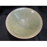 A Chinese Yaozhou lotus bouquet design bowl, 19cm diameter, 6.
