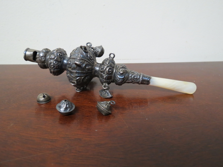 A Victorian silver and mother of pearl baby's rattle and whistle,