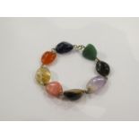 A semi precious multi-coloured stone bracelet