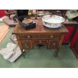 A Georgian mahogany kneehole desk with satin and ebony inlay,