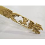 A late 19th/early 20th Century ivory page turner with intricate pierced stag handle with foliage