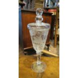An 18th century style engraved glass lidded goblet,