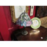 A Tiffany style table lamp base with leaded glass shade