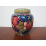 A William Moorcroft 'pomegranate' pot-pourri vase and cover, circa 1912,