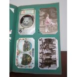 An Edwardian album containing family photographs and postcard greetings, romantic poems,