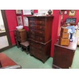 A George III style mahogany serpentine front chest on chest of seven drawers over bracket feet