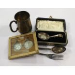 Assorted silver items including mug, spoons,