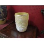 A John Ditchfield iridescent yellow vase, embossed form,