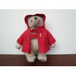 A mid 20th Century Paddington Bear in red duffel coat