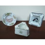 Three early 20th Century advertising ashtrays "Black & White Scotch Whisky" and Mintons "DeReszke"