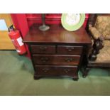 An 18th Century red walnut chest of small proportions having two short and two long drawers with