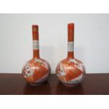 A pair of miniature Japanese vases, slender necks to bulbous body,