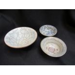 Three Chinese tea bowls including Guan marked crackle glazed example