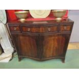 An Edwardian cross banded mahogany serpentine front sideboard,