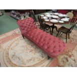 A Victorian scroll end chaise longue,