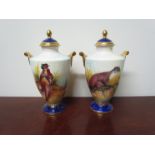 A pair of Aynsley fine bone china lidded urns,