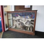 An early 20th Century taxidermy group of game in naturalistic setting