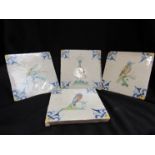 Four continental Delft tiles